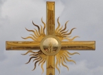 Отражение колокольни в кресте